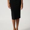 Elegant black midi pencil skirt for women's professional or formal wear, crafted from high-quality fabric, styled with a fitted silhouette for a sleek and sophisticated look.