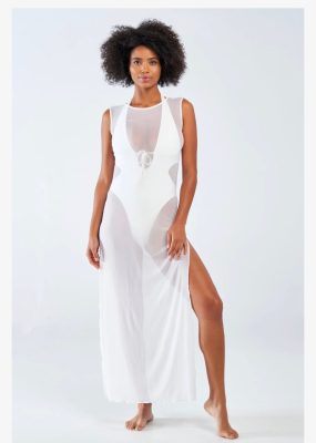 Flowy white maternity maxi dress with sheer panels, adjustable tie front, and side slit for comfortable and stylish maternity wear by Katya Maker.
