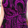 Black and pink zebra print fabric dress, fashionable, stylish, vibrant pattern, designer clothing, women's apparel, artistic design, trendy dress, statement outfit, bold print, modern fashion, unique style, high-quality fabric, casual elegance, runway ready.