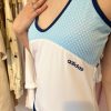 Adidas sports dress with blue and white mesh fabric, fitted athletic wear for active lifestyle and casual wear.