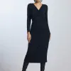Elegant black wrap dress for women, perfect for evening wear, events, or parties. Made from high-quality fabric with a flattering silhouette and stylish long sleeves.