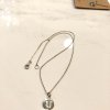 Delicate silver initial 