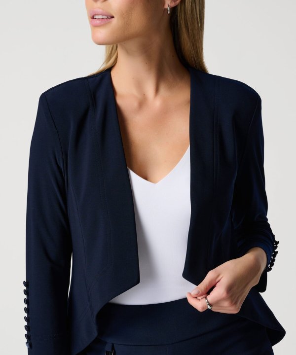 Elegant navy blue tailored blazer for women, perfect for office wear or formal occasions. Made from high-quality fabric, features sleeve buttons, and a polished fit.