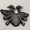 Beaded bee brooch with black lace wings and rhinestone body, handcrafted jewelry, elegant accessory, unique statement pin, artisan jewelry piece.