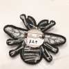 Embroidery patch with black leaves and silver details, handmade textile art, versatile decorative accessory, perfect for clothing or accessories, priced at $29 by katyamaker.