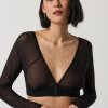 Black sheer long-sleeve crop top with V-neck, stylish and fashionable women's lingerie, perfect for trendy outfits and intimate wear.