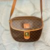 Vintage Celine Brown Monogram Canvas Shoulder Bag with Leather Trim and Gold Hardware, stylish and durable designer handbag.