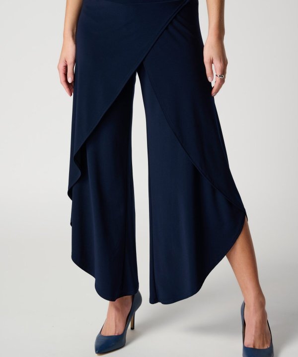 Wide-leg navy blue wrap pants with ruffle details, perfect for stylish office or casual wear.