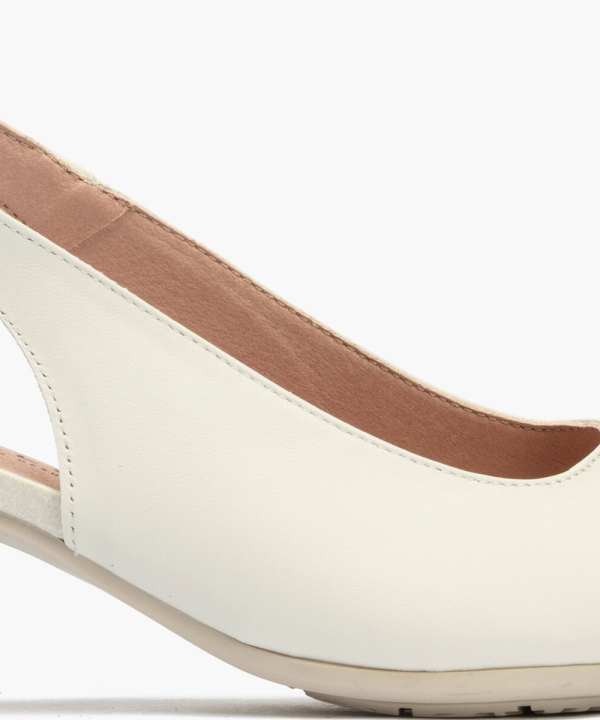 Elegant women's slingback heel with gold tip detail, cream leather upper, blush pink ankle strap with adjustable gold buckle, stylish and comfortable for special occasions or stylish everyday wear.