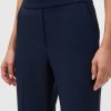 Navy blue tailored women's dress pants with sleek design, high waist, and front pockets for professional and stylish look. Perfect for office wear or formal occasions.