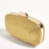Golden woven clutch purse with metallic frame, perfect for evening accessorizing and stylish events.