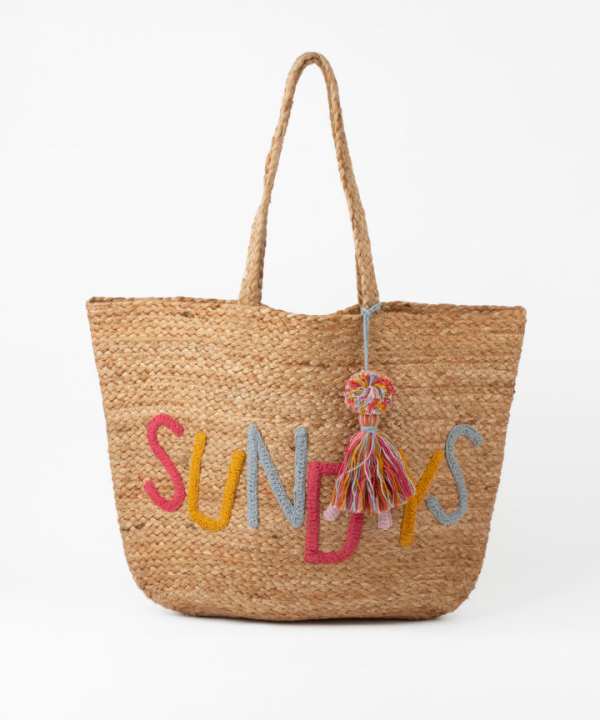 Colorful beach tote bag with embroidered "SUNNY DAYS" lettering and tassel charm, perfect for summer outings and seaside adventures.