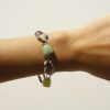 Handcrafted jewelry bracelet with colorful beads, silver links, and modern design, perfect for stylish accessories or gift ideas.