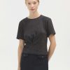 Luxurious black short-sleeve blouse with metallic speckle details, perfect for modern chic outfits and stylish office wear. Elevated casual fashion from Katyamaker.
