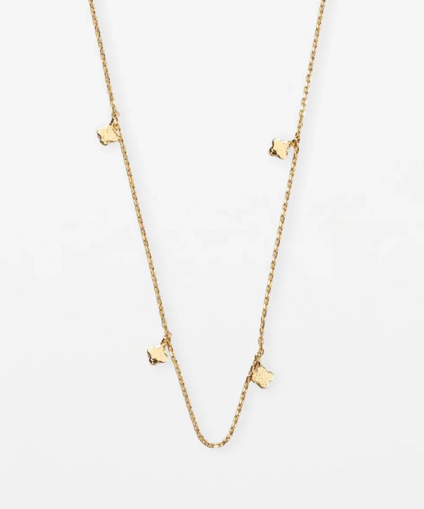 Delicate gold necklace with small clover-shaped charms, perfect for stacking or elegant everyday wear.