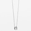 Delicate silver angel wing necklace on a fine chain, perfect for boho or everyday jewelry lovers. Handcrafted jewelry featuring angel wing design, ideal for gift-giving or personal style.