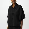 Black fashion jacket with large buttons and wide collar for women.