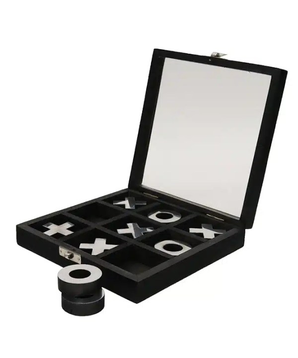 Play tic tac toe game with black and white game pieces in an elegant storage box, ideal for fun and interactive entertainment, designed for all ages, perfect for family game nights.