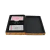 Elegant poker card set with a black and wood finish box, includes two decks of playing cards and a dice cup for casino-style gaming and entertainment.