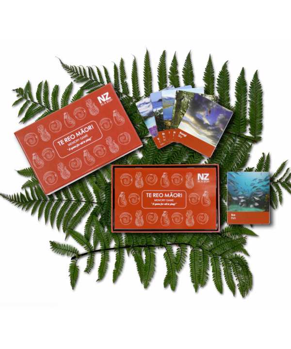 Memory game featuring Māori designs and scenic landscape cards, displayed on green fern leaves, promoting Māori culture, nature, and eco-friendly products.